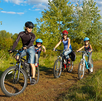 family riding bicycles